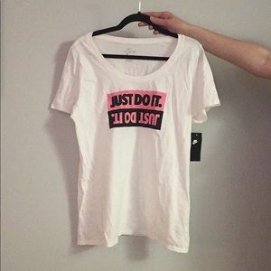 The Nike tee athletic cut pink and black design